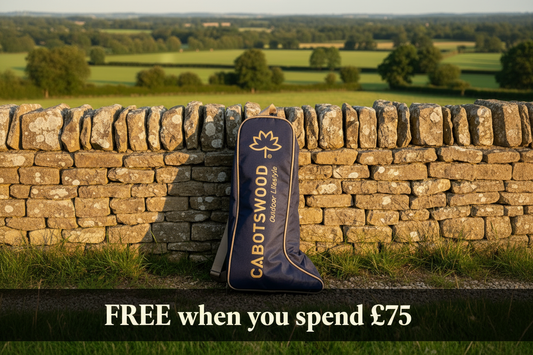 Cabotswood boot bag leaning on stone wall in countryside, free with Â£75 spend