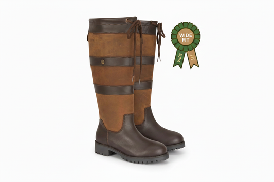Brown leather country boots with wide fit, waterproof design, and rugged sole for outdoor wear